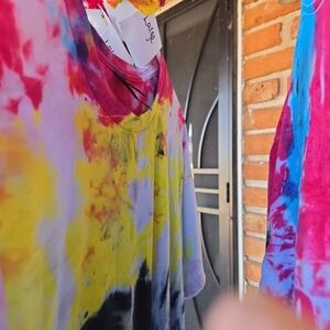 4 adult large 100% cotton short sleeve tie dye. 3 medium adult 100% cotton short